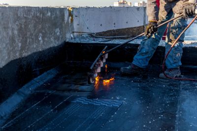 Professional roofing team at work